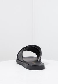 KIOMI Platt slip-in - black