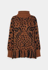 Brown knitted sweater featuring a black leopard print design, turtleneck, and black fringe detailing at the hem.
