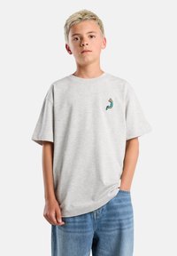 Light gray cotton t-shirt with oversized fit, crew neck, short sleeves, and a small blue-green graphic on the left chest area.