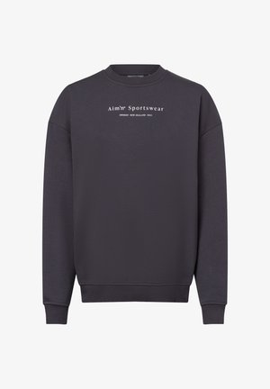 Dunkelgrauer Sweatshirt aus weichem Material, mit Rundhalsausschnitt, leicht lockerer Passform und weißem Text-Logo auf der Vorderseite.