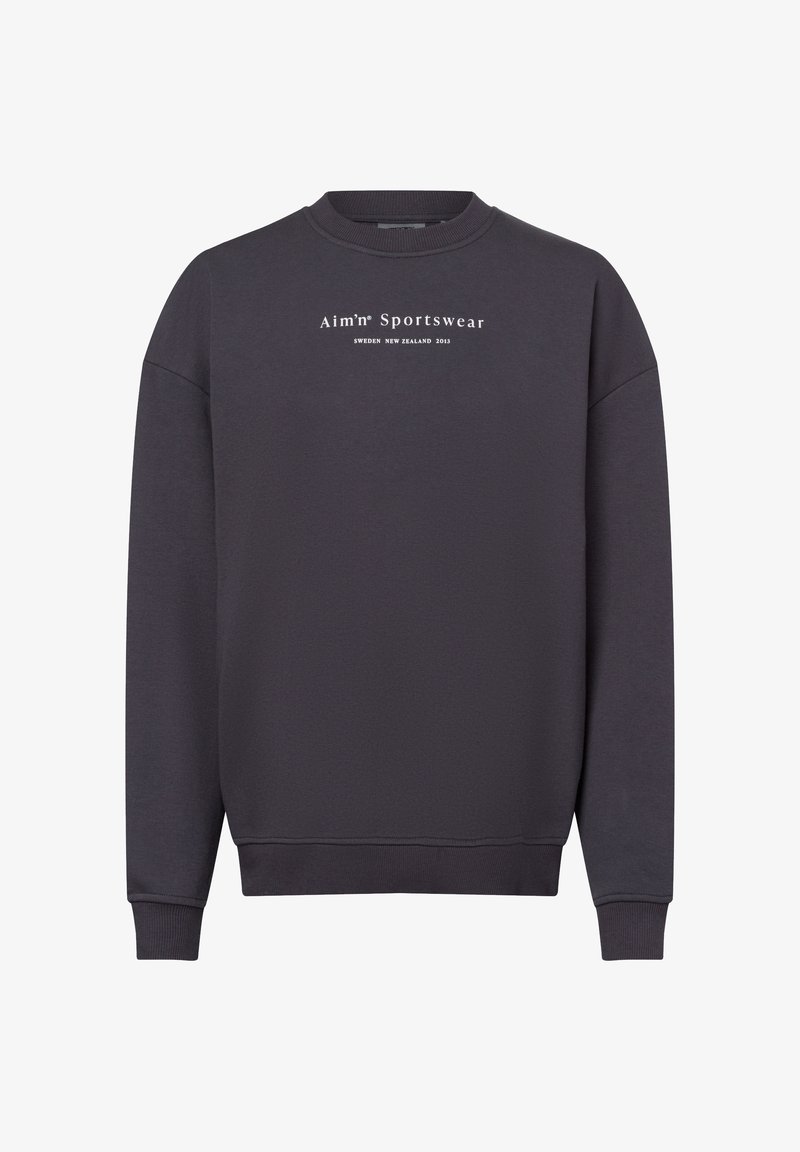 Donkergrijze sweatshirt van zachte stof, met een ronde hals, een iets oversized pasvorm en een wit tekstlogo aan de voorkant.