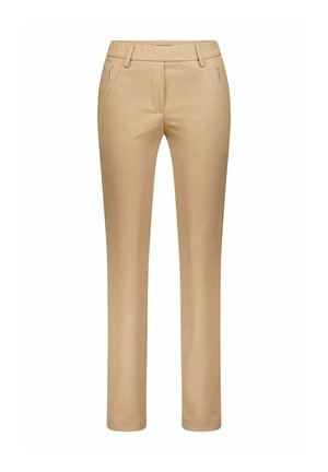 Pantalon beige avec une coupe ajustée, en tissu lisse, et deux poches à fermeture éclair à l'avant. Conçu avec un devant plat et une silhouette à jambe droite.