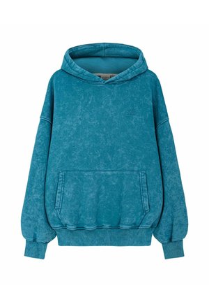 Miętowa bluza z teksturowanego materiału, z przednią kieszenią typu kangurka i ściągaczami przy rękawach. Luźny fason z kapturem zapinanym na sznurek.