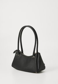 Black handbag with a textured finish, a tapered shape, dual handles, and gold-tone hardware accents. Zippered top opening.