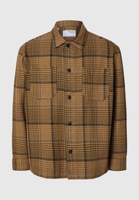 Brązowa i żółta koszula w kratę wykonana z tkaniny, z kołnierzykiem, zapięciem na guziki z przodu i kieszonką na piersi. Teksturowana z wyraźnymi wzorami.