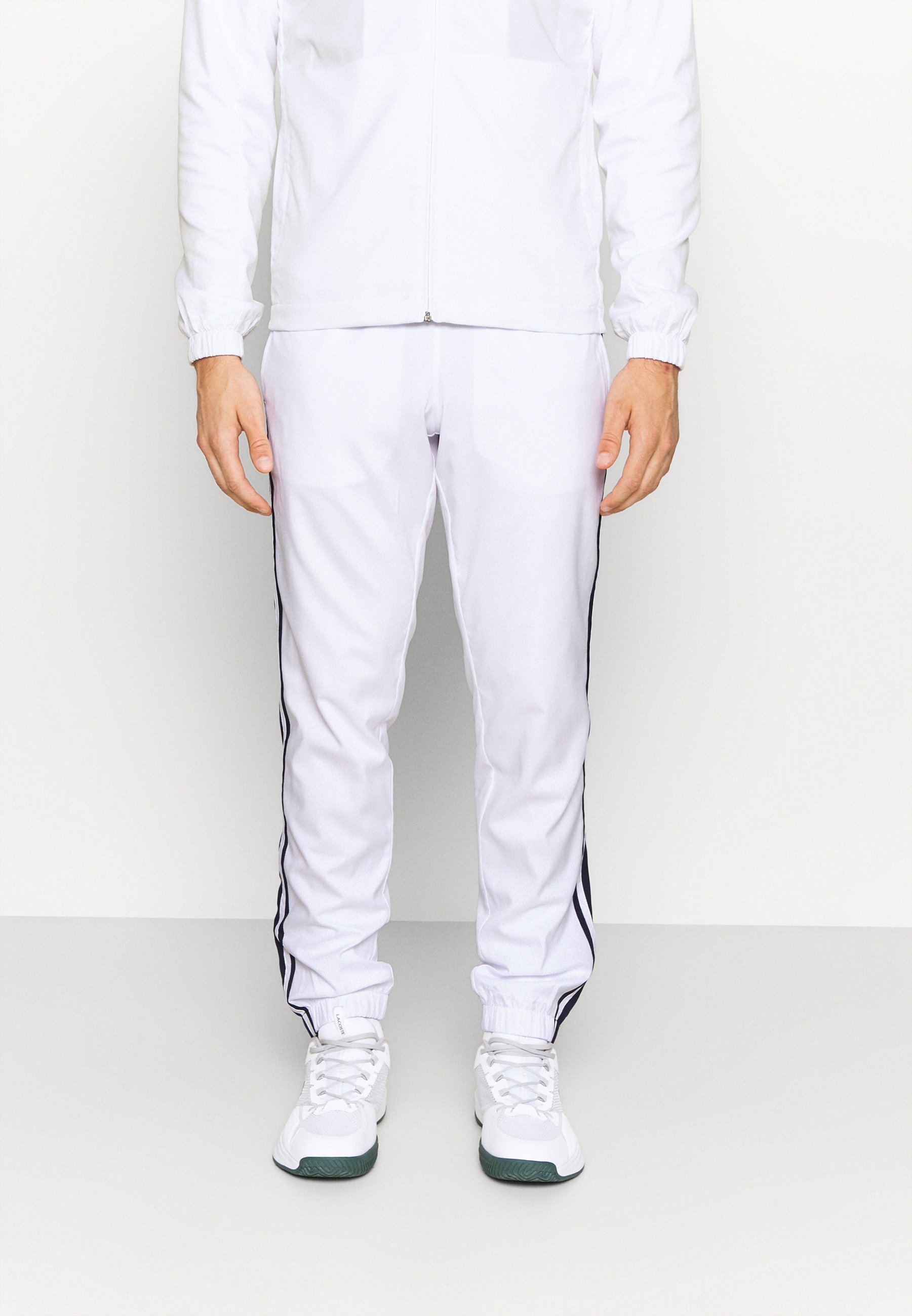 survetement lacoste blanc