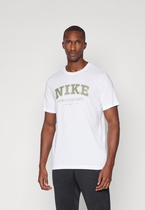 White cotton t-shirt featuring large green "NIKE" text and gray "ATHLETIC DEPT." underneath. Simple round neckline and short sleeves.