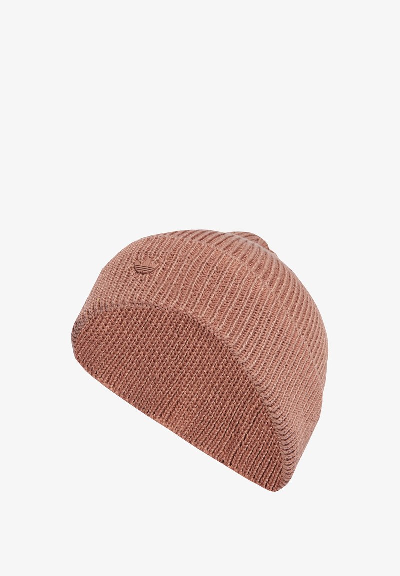 Knitted beanie hat in muted pink, featuring a ribbed texture, soft material, and a small embossed logo on the side.