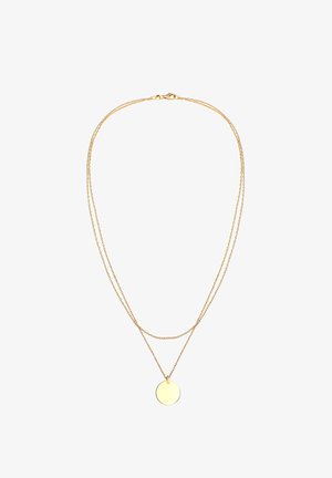 Goldene, doppellagige Halskette mit zwei feinen Ketten und einem runden Anhänger mit glatter Oberfläche. Das Design ist minimalistisch und elegant.