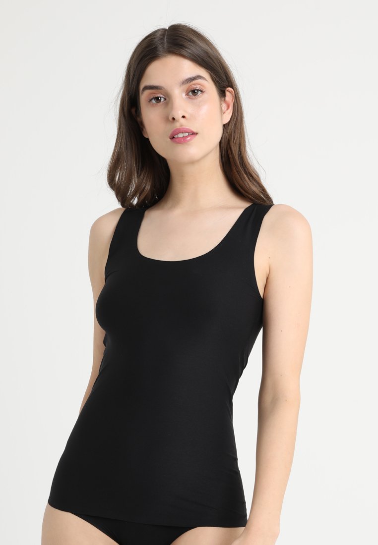 Black tank top made from a smooth, stretchy fabric. Features a rounded neckline and wide straps, with a fitted silhouette.
