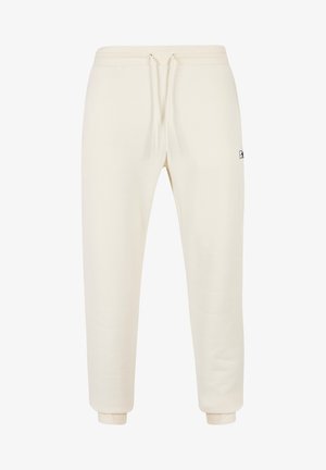 Crème-kleurige joggers van zachte stof, met een elastische tailleband met trekkoord, cuffed zoom en een klein logo aan de zijkant.