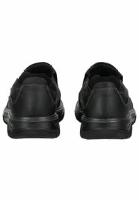 Schwarze Sneakers mit einem Obermaterial aus glänzendem Leder, versehen mit grauen Nähten und einer strukturierten Gummisohle. Entworfen mit einer schlanken Silhouette.