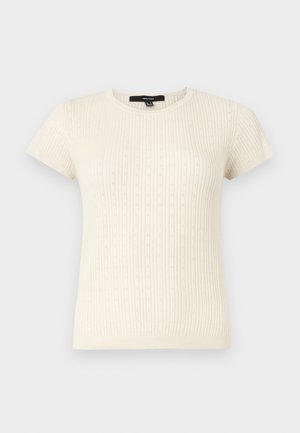 Top in maglia crema a maniche corte con trama a coste e piccolo motivo a puntini traforati, scollo tondo e silhouette aderente.