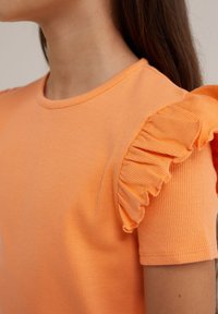 WE Fashion Marškinėliai su spaudiniu - orange