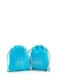 Kaks türkiissinist nööriga kotti pehmest kangast, millel on ringikujuline logo "Elli" valges kirjas.