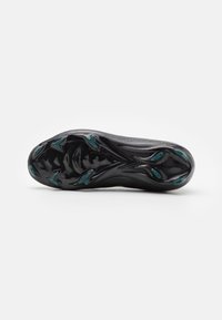 Black soccer cleat sole with six teal cleats on a white background, showing textured and glossy surface details.