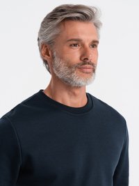 Navyblauwe sweatshirts met ronde hals, gemaakt van zacht, gestructureerd materiaal met geribbelde manchetten en halslijn, met een slim fit.