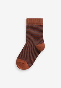Gestreifte Socken in rostorange und dunkelblau. Gerippter Bund, weich strukturierte Oberfläche und verstärkter Zehenbereich. Standarddesign in Knöchellänge.
