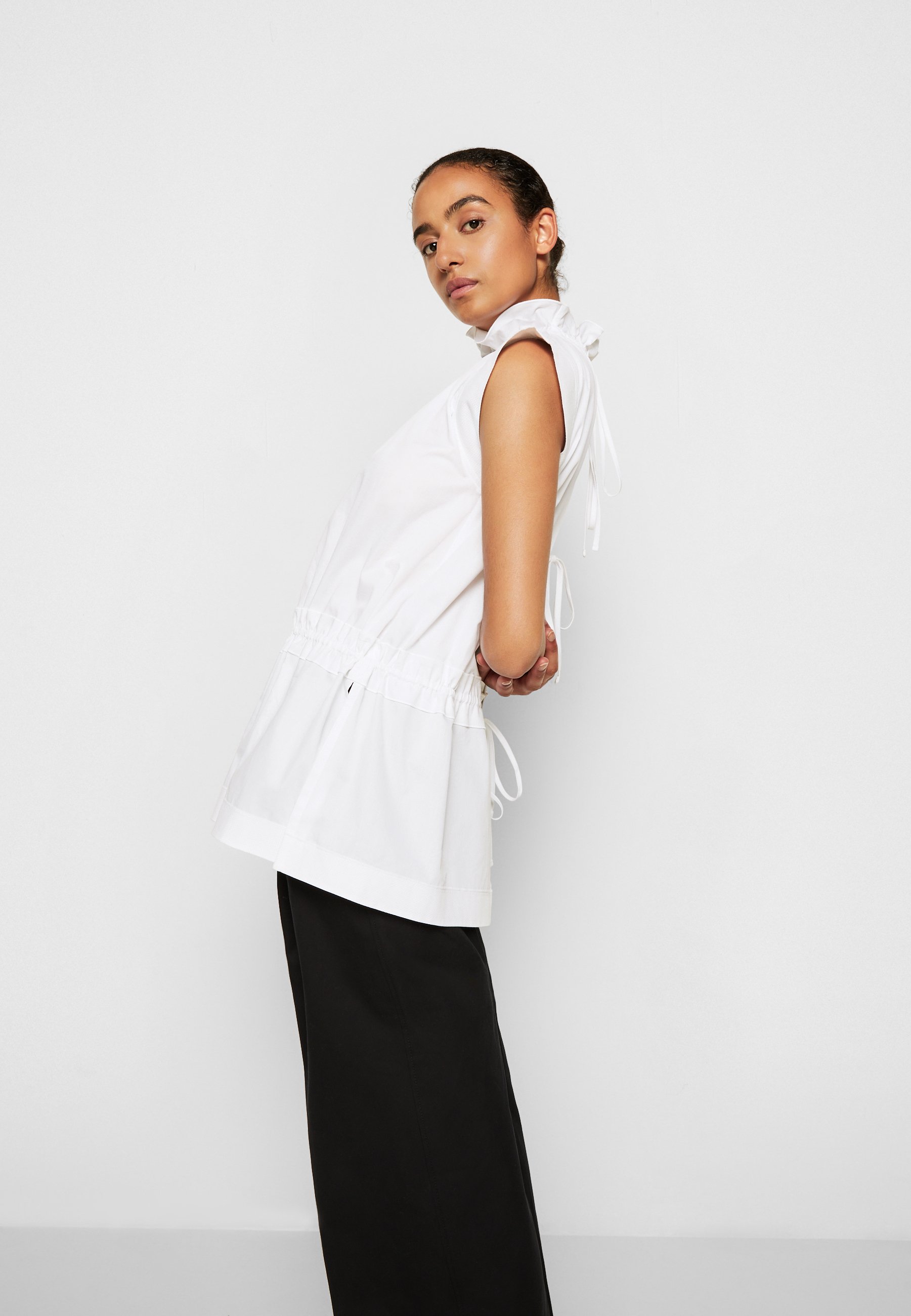 Women SLEEVELESS RUFFLE NECK - Blouse Women SLEEVELESS RUFFLE NECK - Blouse