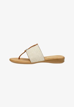 Beige slipper sandaal met een gestructureerde stoffen band en leren accenten in bruin, voorzien van een platte zool en subtiele metallic details.