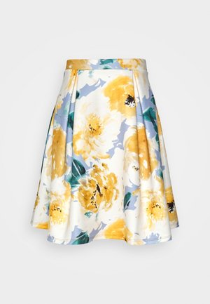 Bloemen skaterrok met grote gele en witte bloemen op een lichtblauwe achtergrond. Gemaakt van een zachte stof met een aansluitende tailleband.
