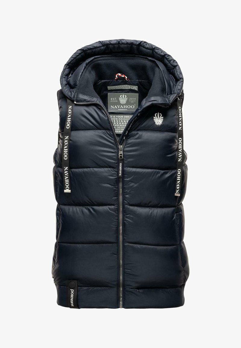 Tumesinine puffer vest kapuutsiga, kootud tekstuuriga, ees lukuga ja logomotiividega rihmadel. Sees on silt brändi informatsiooniga.