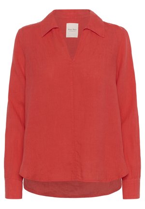 Red linen blouse with a v-neck and long sleeves. Features a buttoned collar and a slightly curved hem for a relaxed fit.