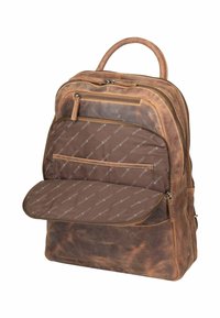 Sac à dos en cuir marron avec une finition lisse, doté d'une fermeture éclair, d'un intérieur rembourré et d'un revêtement en tissu marron avec logo.