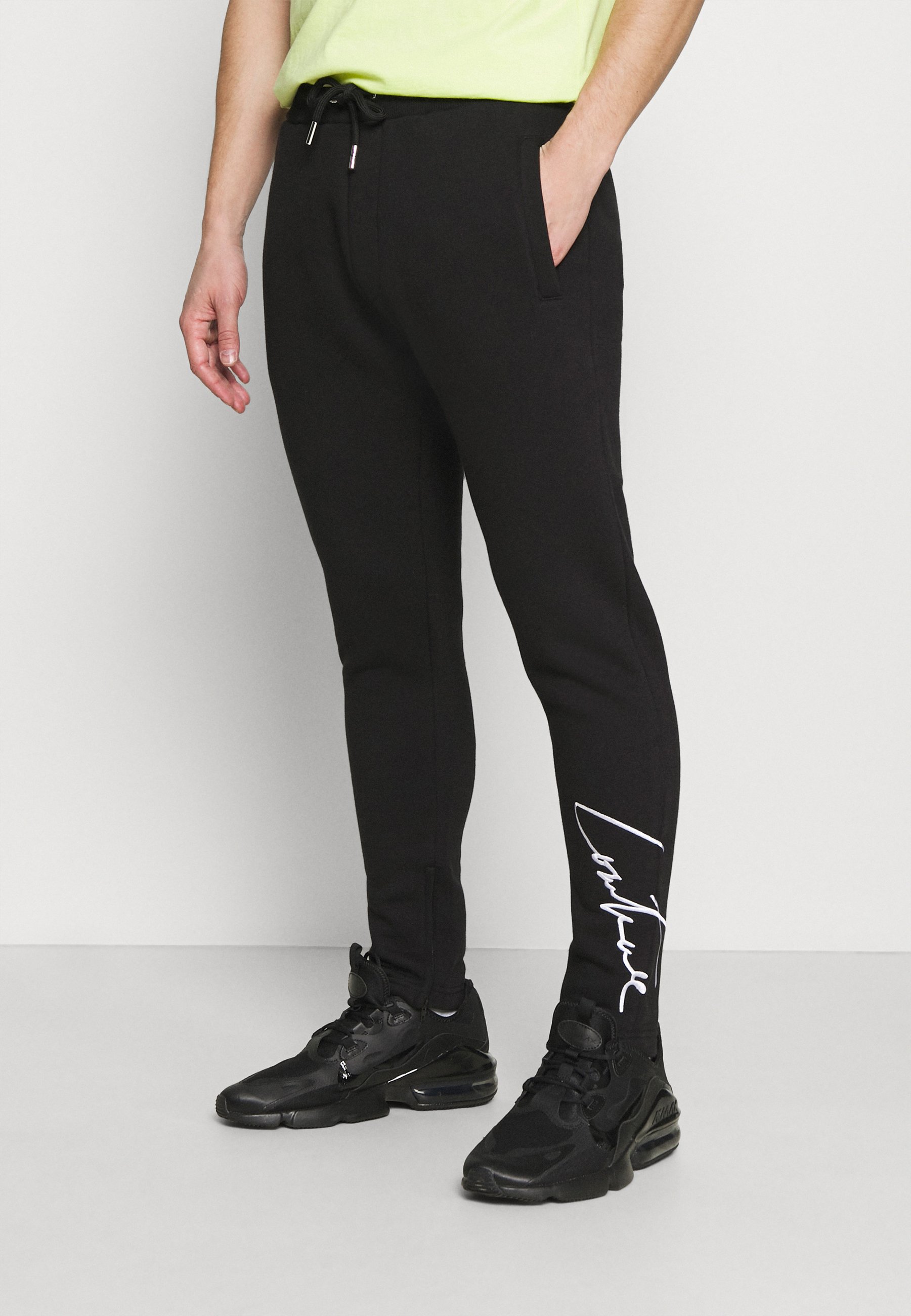 couture black tracksuit