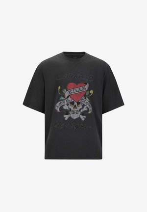 Black graphic t-shirt featuring a skull, red heart, and "Love Kills" text, embellished with colorful rhinestones and a loose fit design.