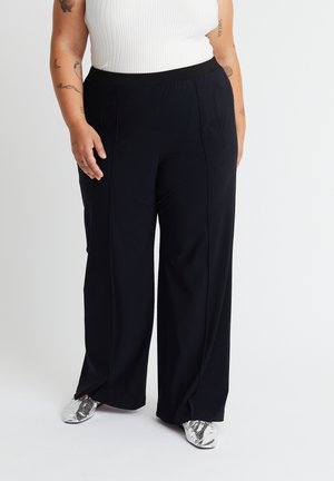 ADDISON - Trousers - black