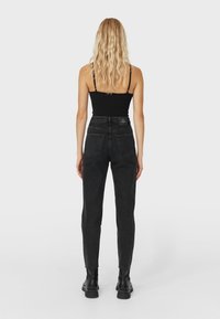 Stradivarius Vaqueros slim fit - black