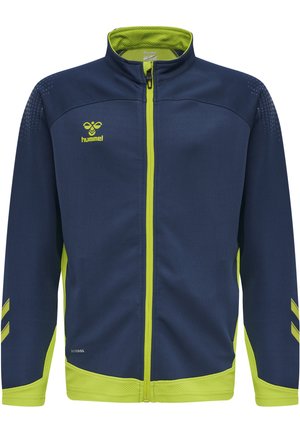 Navyblaue Zip-Jacke mit limettengrünen Akzenten, ausgestattet mit einem strukturierten Mesh-Kragen, einem Logo auf der Brust und kontrastierenden Seitendetails.