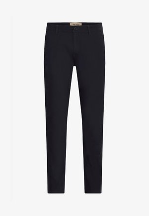 Must have kitsid must kauni nööbi ja lukuga, vöödega ja peente niidist detailidega.