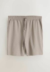 Jasnoszare szorty wykonane z miękkiego materiału, z elastycznym pasem na gumce i sznurkiem oraz bocznymi kieszeniami. Gładka faktura, prosty krój.