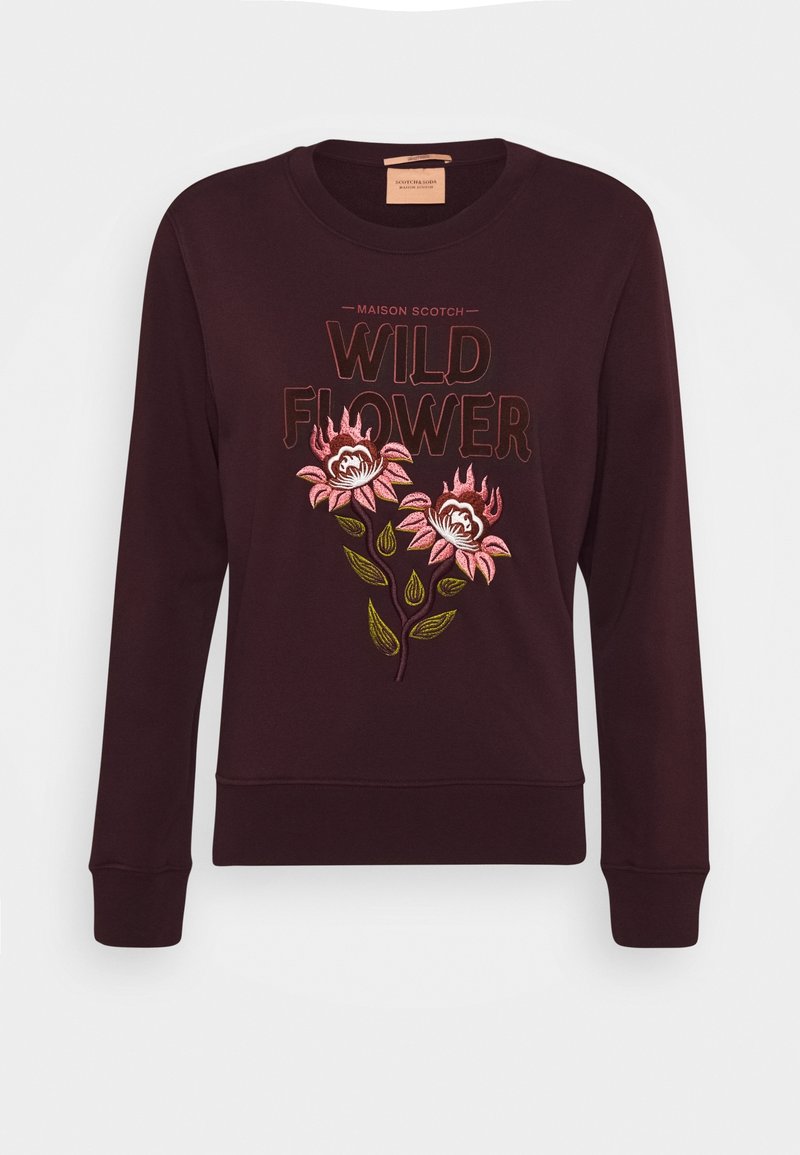 Sudadera burdeos de manga larga, con bordado floral y el texto "WILD FLOWER" en un color contrastante. Cuello redondo, puños acanalados.