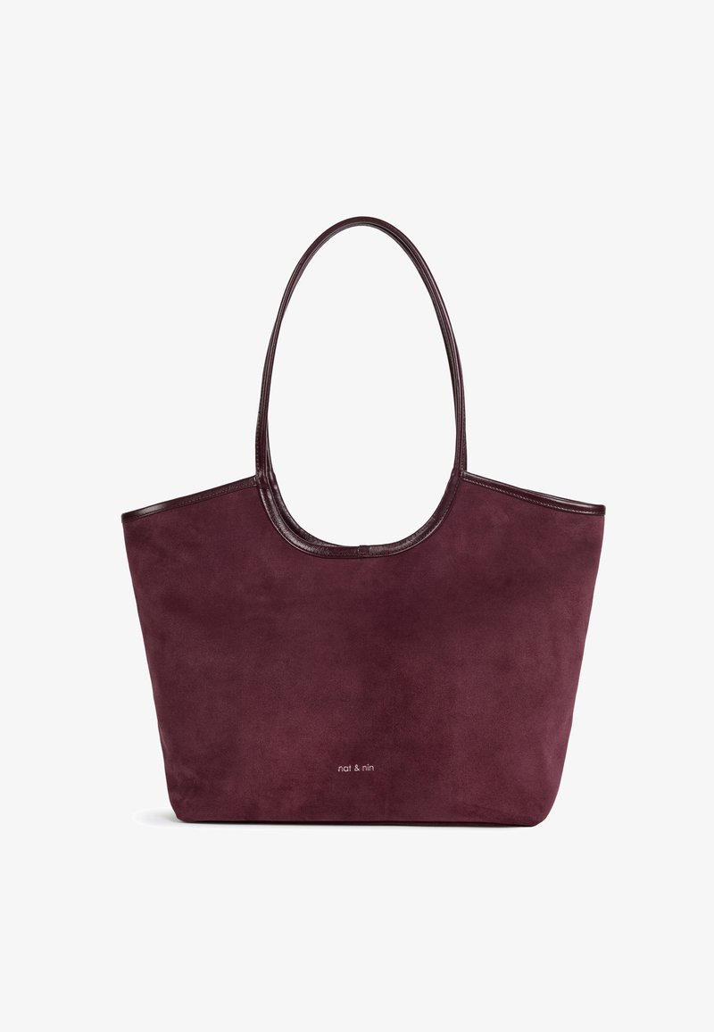 Grand sac cabas en daim bordeaux foncé avec fines poignées et petit logo "nat & nin" au centre à l'avant.