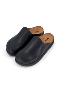Black clogs with a smooth, matte finish. Contoured shape with open back and a cushioned tan insole. Solid black rubber outsole for grip.