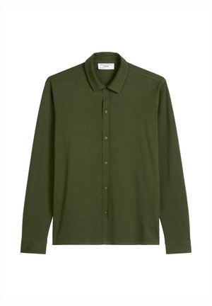 Ilgais rankovės marškiniai, užsegami mygtukais, alyvuogių žalios spalvos, pagaminti iš minkštos, glotnios medžiagos. Su klasikine apykakle ir priekiniais mygtukais, kurių spalva derinama.