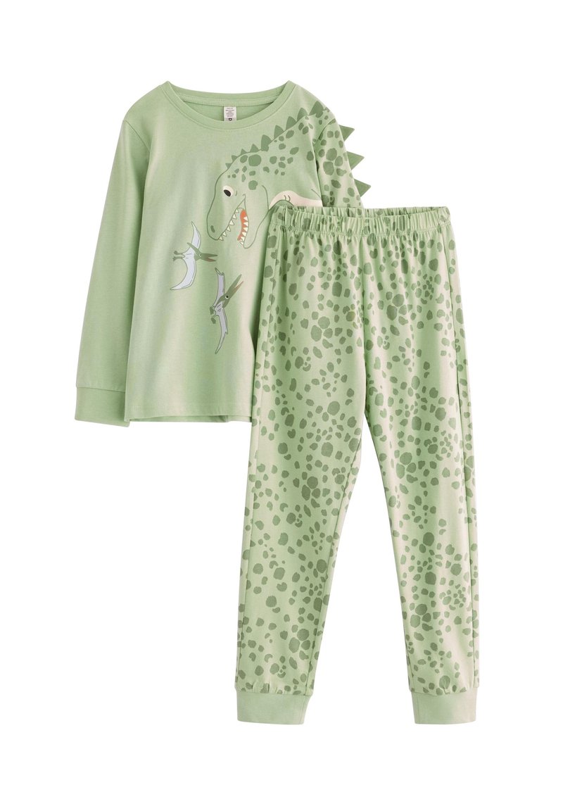 Ensemble de pyjama sur le thème des dinosaures, comprenant un haut à manches longues avec un motif de dinosaure et un pantalon assorti à motif de taches vertes.