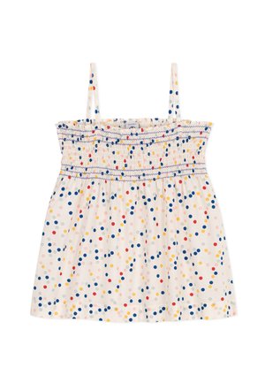 Witte mouwloze top met een geplooid smock-borstmateriaal, voorzien van een veelkleurig stippenpatroon in rood, blauw, geel en grijs.