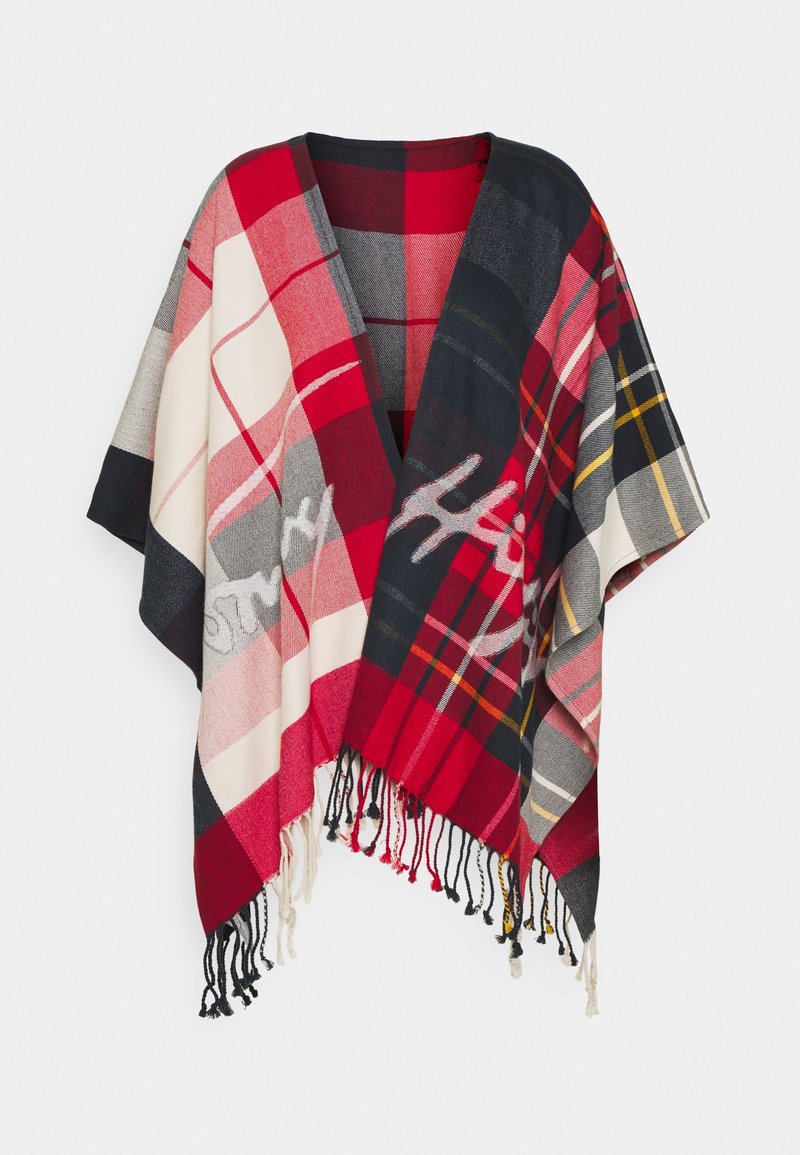 Écharpe à carreaux rouges, noirs, blancs et jaunes avec des bords effilochés et un texte en cursive blanche sur le devant, présentée sur un fond blanc.