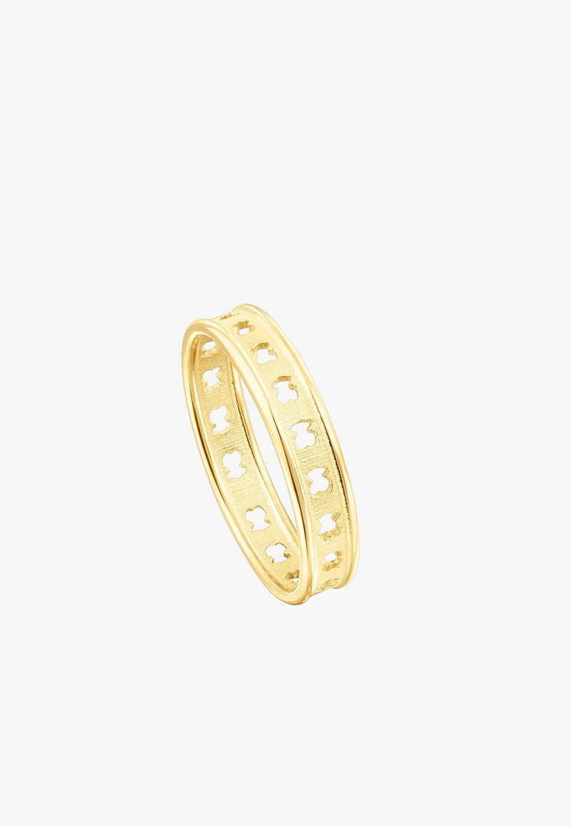 Gold-colored ring featuring a cut-out pattern with rounded edges. The surface is smooth with a subtle textured finish. Nested design.