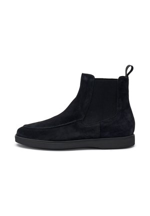 Stivaletti neri in suede con pannelli laterali elasticizzati, punta arrotondata, linguetta e suola in gomma nera, caratterizzati da una texture liscia e un design minimal.