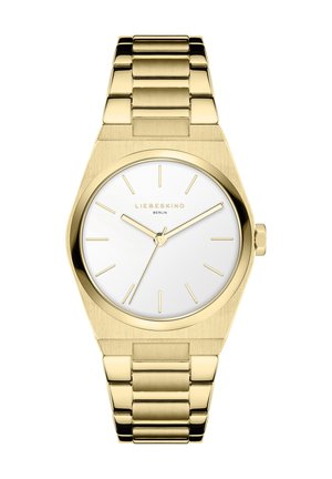 Guld metalur med en rund hvid urskive, minimalistiske time markører og et poleret lenkearmbånd. Glat, moderne design med en mat finish.