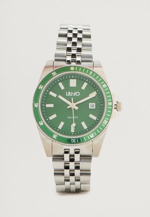 Srebrny zegarek ze stali nierdzewnej z zieloną tarczą, mechanizmem kwarcowym, srebrnymi znacznikami godzin, wyświetlaczem daty oraz metalową bransoletą linkową.