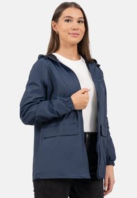 Navyblauwe lichtgewicht jas met een capuchon, elastische manchetten, voorzakken en een rits. Gladde textuur, casual ontwerp.