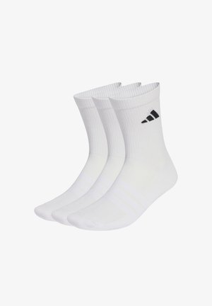 Three pairs of white athletic socks with ribbed texture, featuring black Adidas logo, cushioned footbed, and reinforced heel and toe.