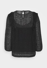 Blusa nera in pizzo con maniche a tre quarti, apertura a chiave sulla schiena e intricati motivi floreali con dettagli a ruches sulle spalle.