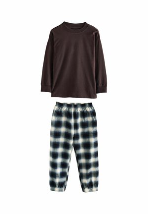 Brūna garām piedurknēm krekls ar apaļu kakla izgriezumu, apvienots ar tumši zilu un balto kokaidiņiem rakstīto pidžamu biksēm, kas aprīkotas ar elastīgu jostu un sašaurinātām auduma kājām.